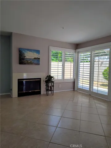Living area with slider to the private green space.
