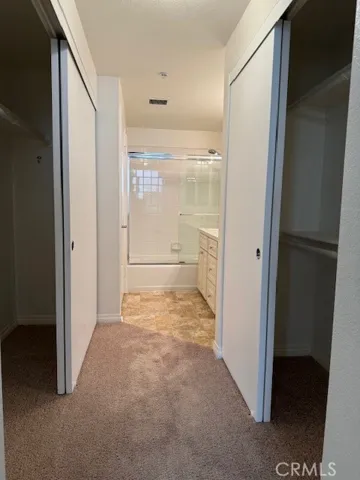 Primary bedroom dual side closets