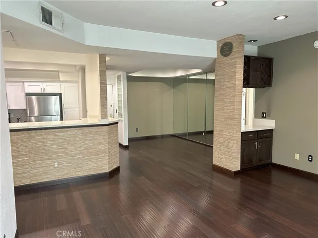 Open floor plan.  Living room, dining room and kitchen.