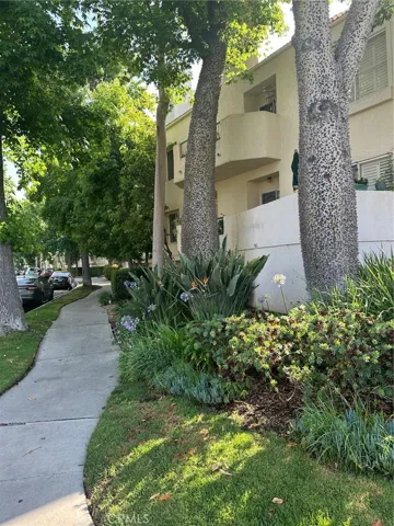 Exterior on Sylmar Ave with sidewalks.