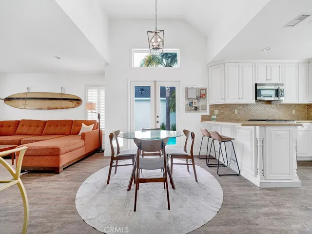 view of kitchen, dining, and family room from living room