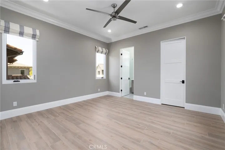 3rd bedroom with ceiling fan and Onsuite bath