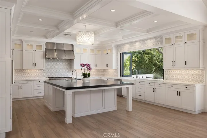 Chefs kitchen with soapstone island