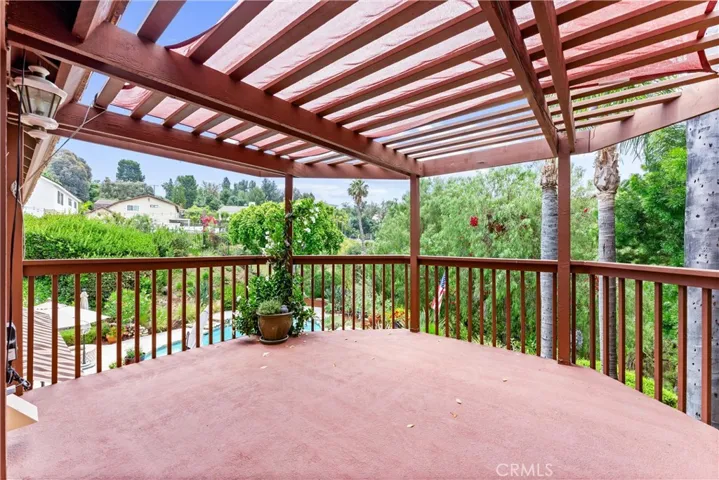 Porch off the bedrrom with a private staircase down to the lush back yard