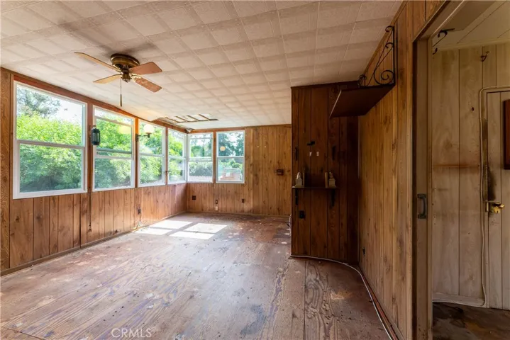 upstairs could be den or primary suite