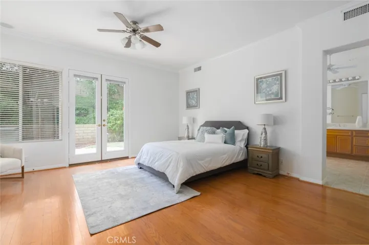 Spacious Primary Bedroom with high ceilings