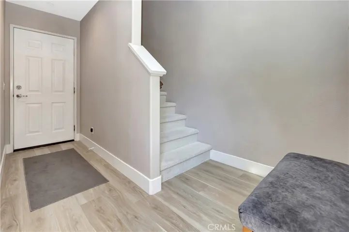 Unit entery. clean wood laminate.