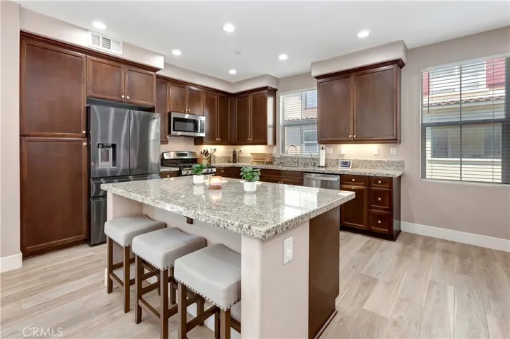 Kitchen granite island with large gathering area