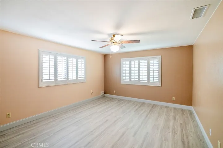 BEDROOM ONE, BIG ROOM WITH LOTS OF LIGHT, CEILING FAN