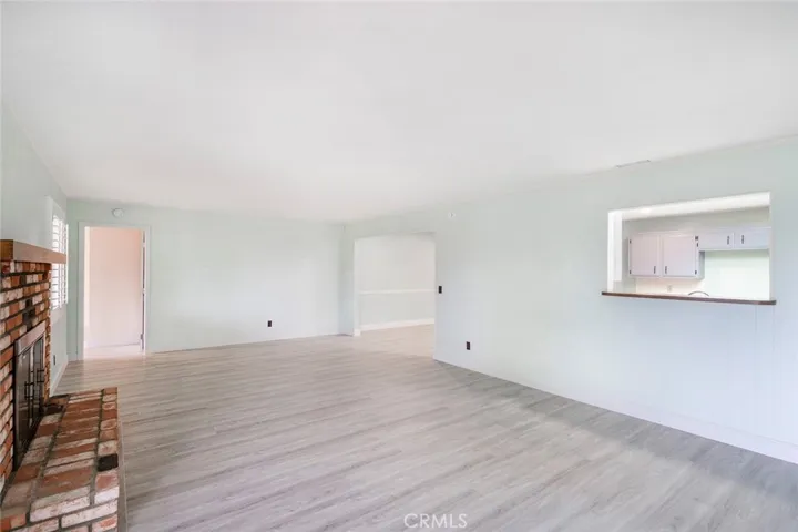 FAMILY ROOM WITH KITCHEN PASS-THROUGH