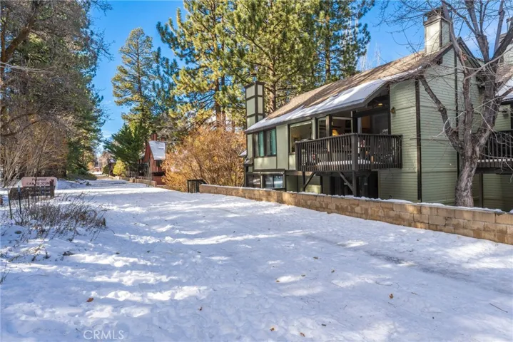Back of house facing the Forest. Deck off back. Walk down this path to Snow Summit. Or walk straight thru forest to chair 10.