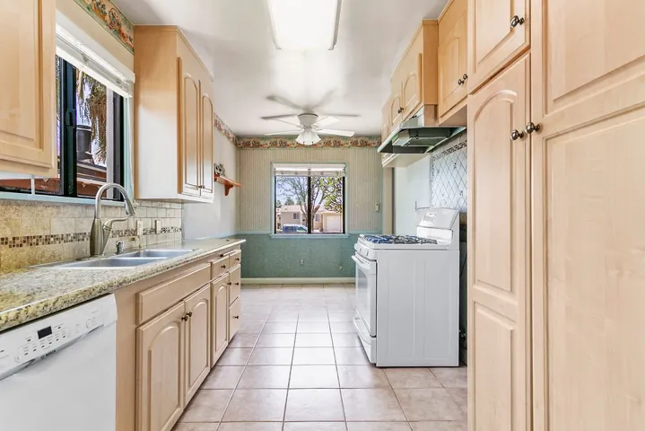Refreshingly bright galley kitchen