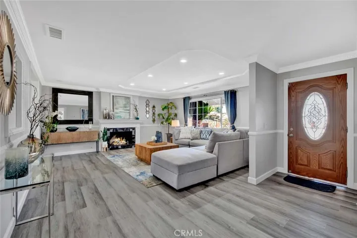 Living room with entry door view