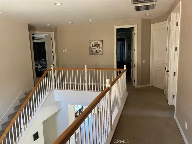 Upstairs hallways 4 bedrooms, laundry and two full bathrooms