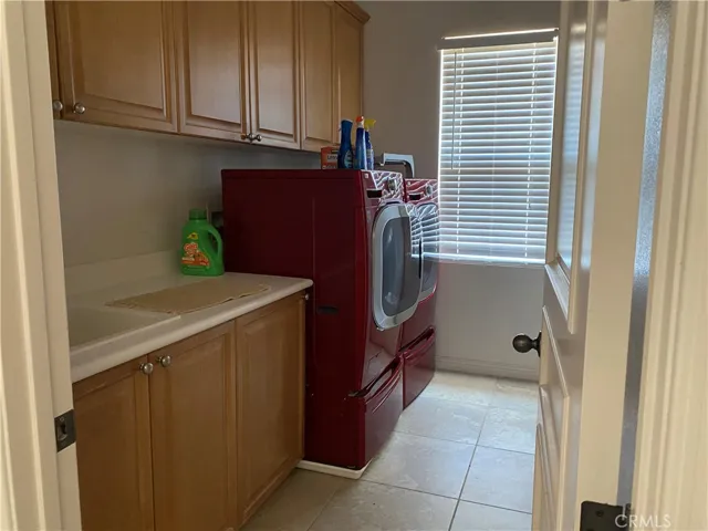 Laundry Room upstairs with sink