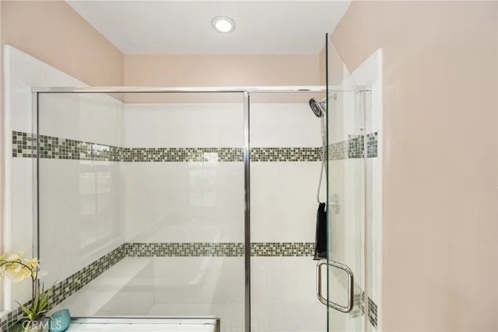 a spacious walk-in shower