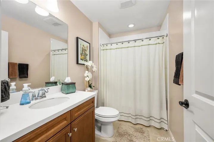 a main-level bathroom, with a tub and shower