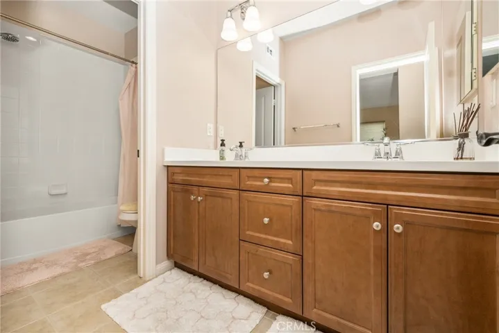 the upstairs guest bath features two sinks