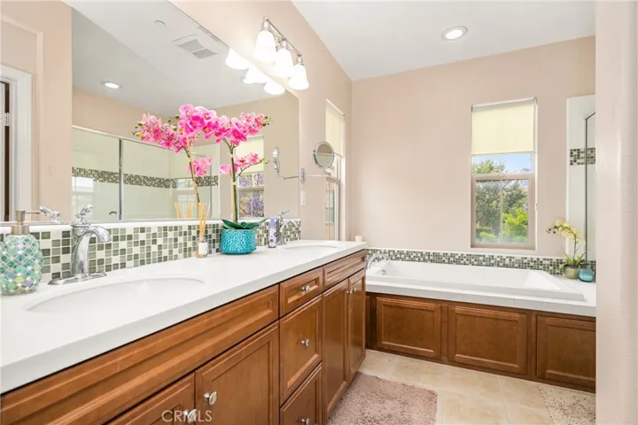 dual vanity areas, and plenty of storage space