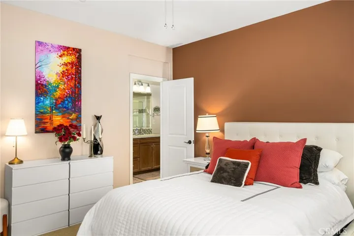 a spacious primary suite offers a touch of luxury
