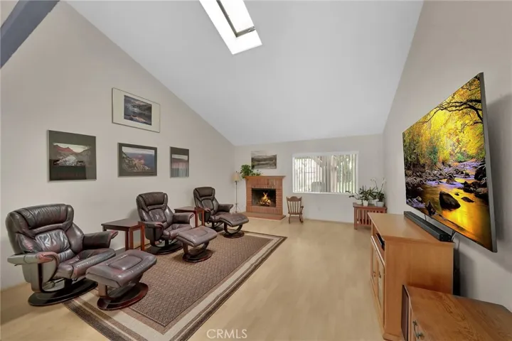 living room with skylight