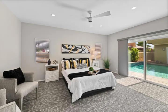 Primary Bedroom with View of Pool
