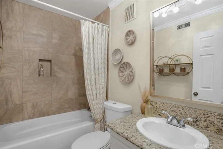 FULL secondary bathroom in hallway (directly across from bedroom)