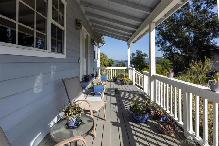 Inviting front porch to sit and enjoy the views