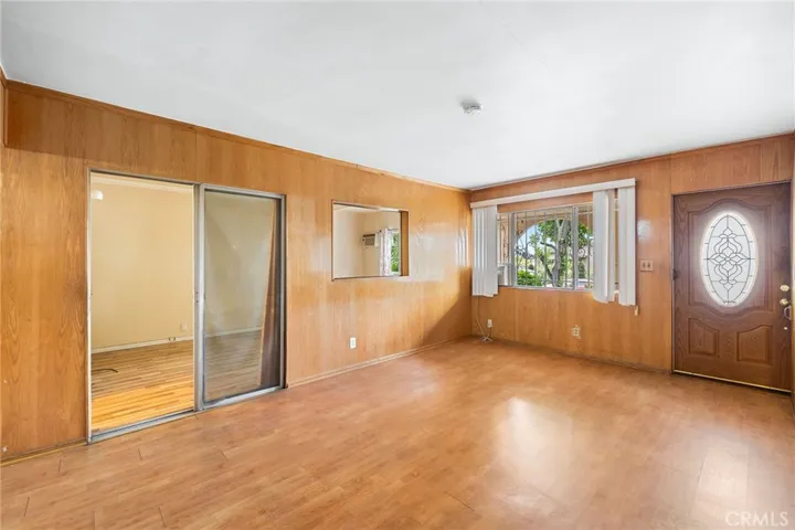 Looking back toward the front door and one of the bedrooms at 3723 East 5th Street