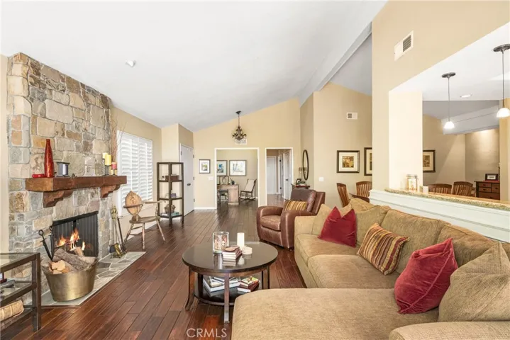Living room looking toward den and hallway to bedrooms