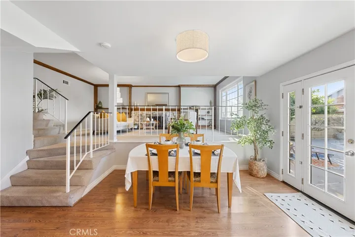 View from kitchen to dining area and living room.