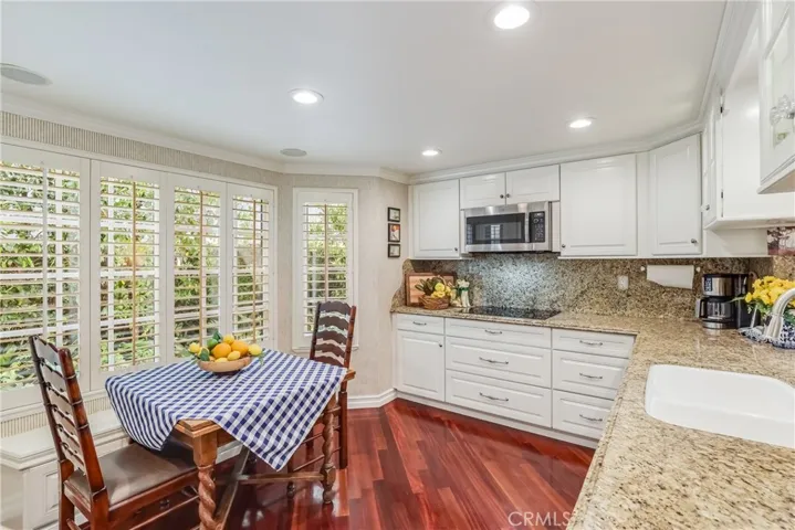 The eat in kitchen has a special built in bench seat for feeding those kids