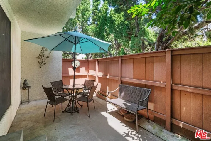 Dappled sunlight on patio