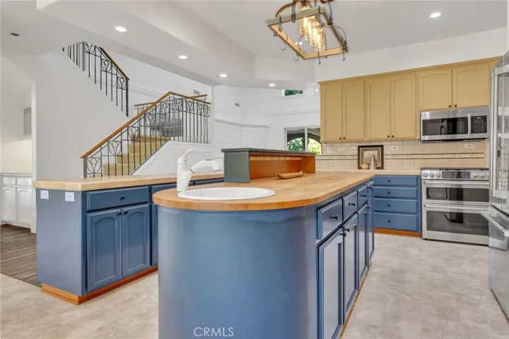 Chef's Kitchen with extra prep sink, all stainless steel appliances, and so much counter space!