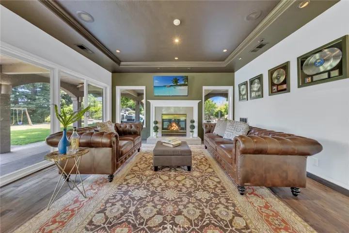 Stately Living Room with Pool Line View!