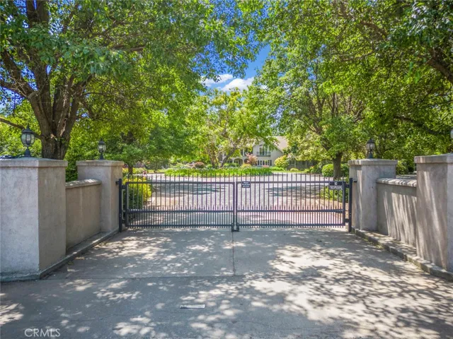 Private Gated Entrance opens to a circular driveway to the front of this Estate Property!