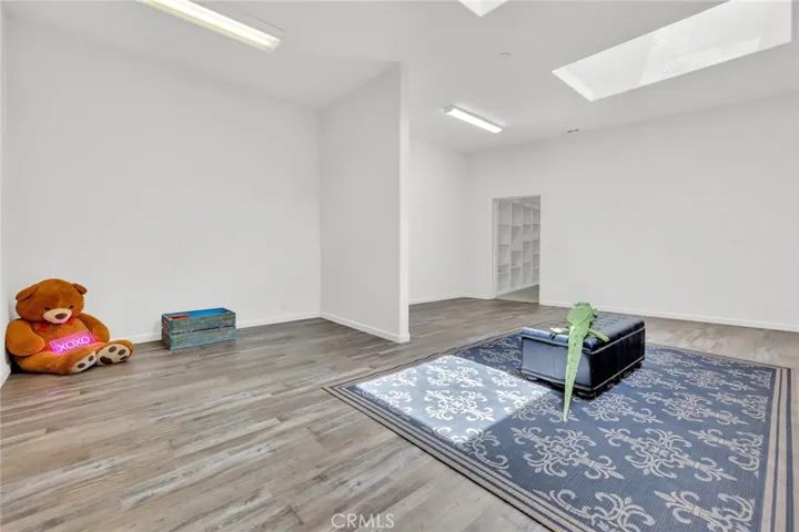 Huge Bonus Room with sun filled Skylights located upstairs that might be capable of adding an additional bathroom!