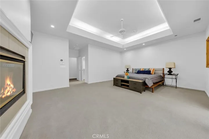 Incredible spaciousness in the Primary Master Suite with Dual Faced Fireplace!