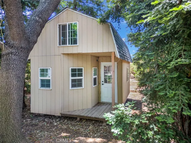 Would this be the Kids playhouse or??  Partially drywalled inside with loft!