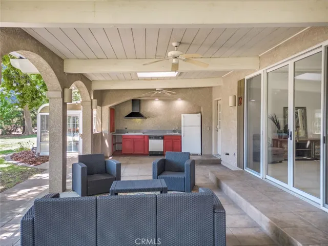 Huge wrap around covered patio with outdoor kitchen!