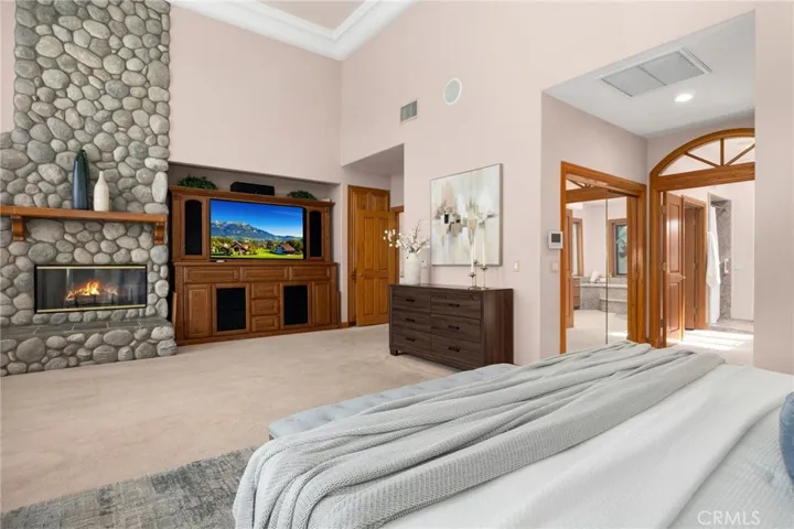 Master bedroom fireplace and entertainment area