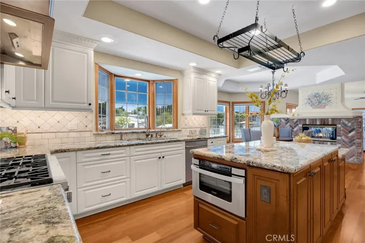 Center island in kitchen with microwave drawer