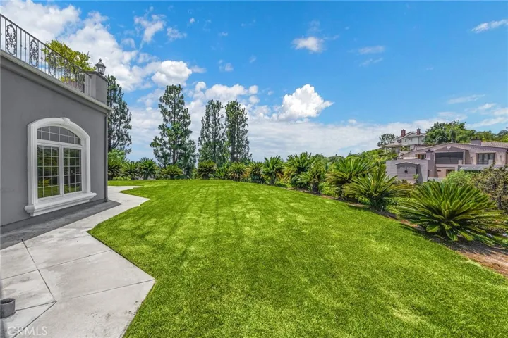 Lush landscaping in backyard.