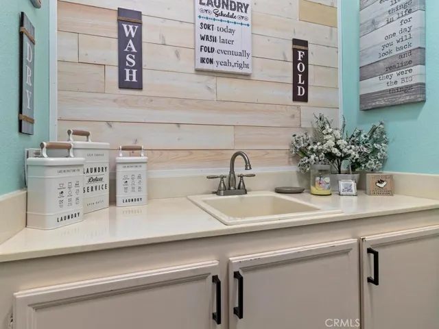 Laundry room with sink