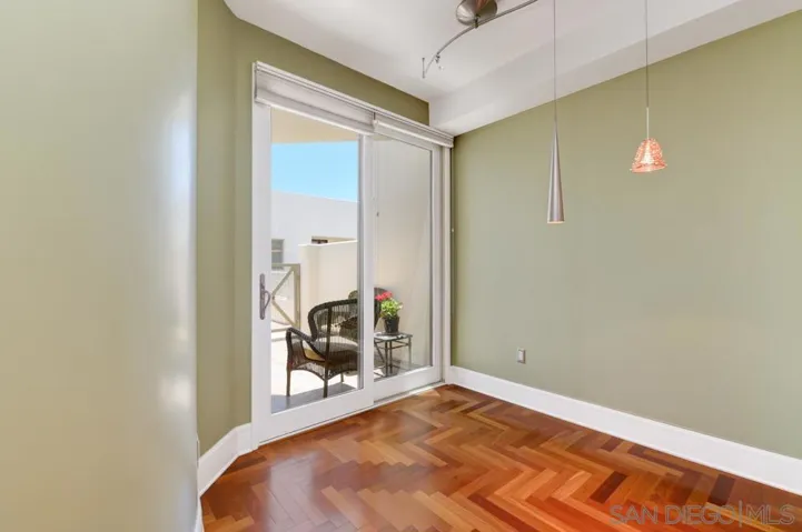 kitchen sitting area, opens to the front patio.