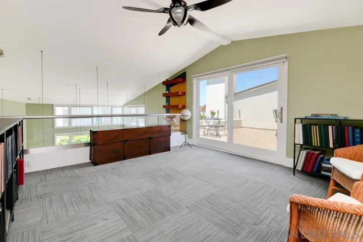 Loft opens to the top floor patio/deck.