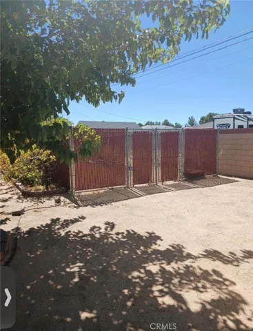 Backyard gated area, large side gate, opens up to additional separated gated area.