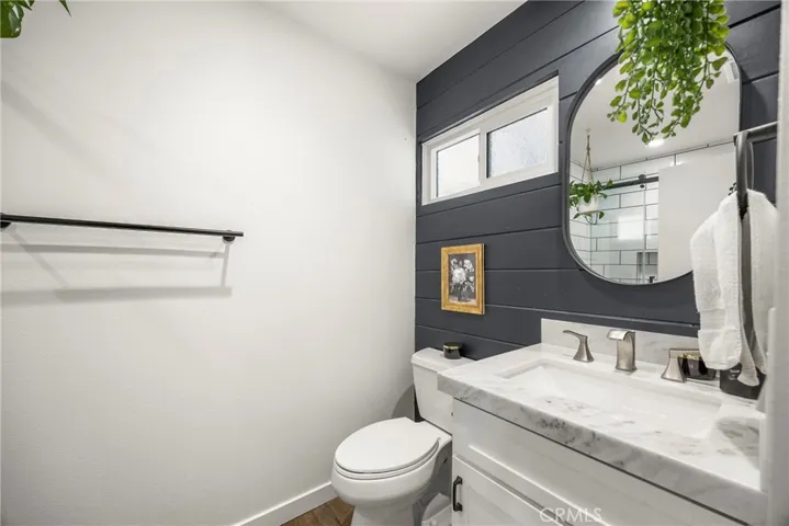 Downstairs bathroom which has a shower.