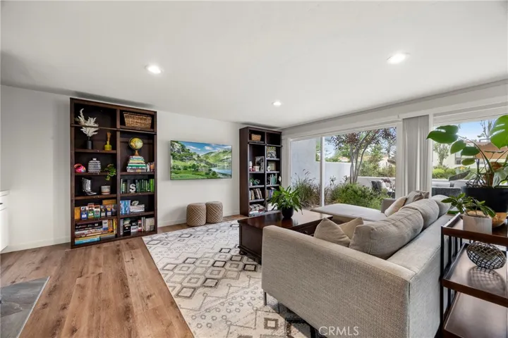 The spacious living room with a lot of natural light.