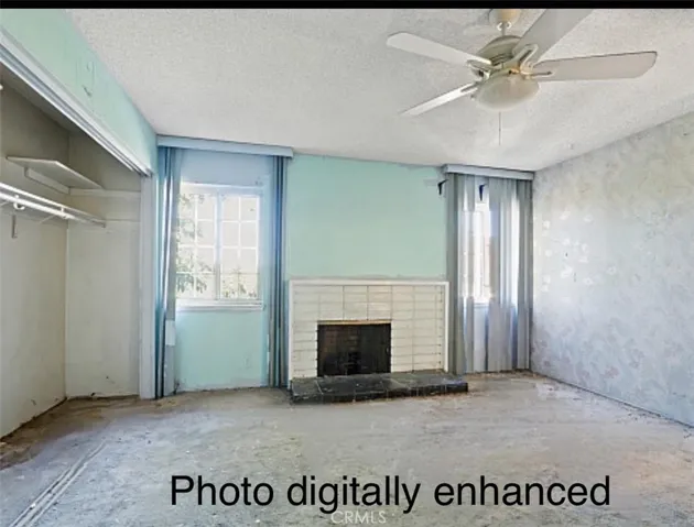 Master bedroom upstairs with fireplace
